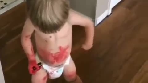 cute kid playing with lipstick