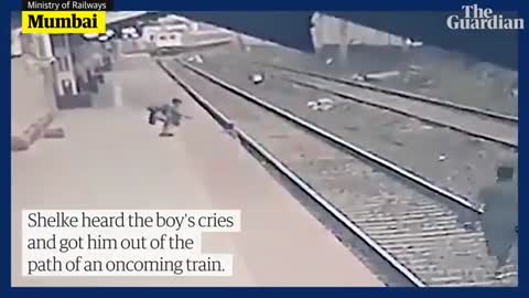 Railway worker saves boy from being run over by train