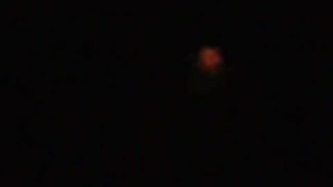UFO Sightings, Orange glow over the sea bay, Russia