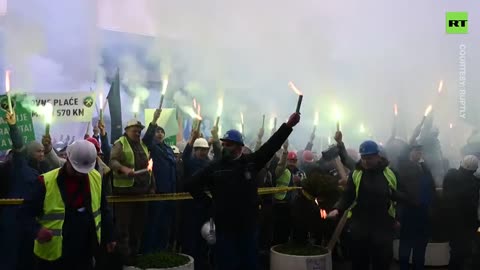 FLARES light up Sarajevo streets at miners' protest