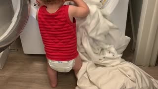 Little Guy Helps with Laundry