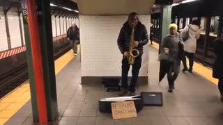 Street performance - The Man's Playing Saxophone