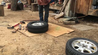 Mounting a tire using the walk on method no tire machine