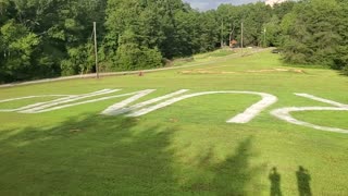 Trump's Name Mowed into Yard