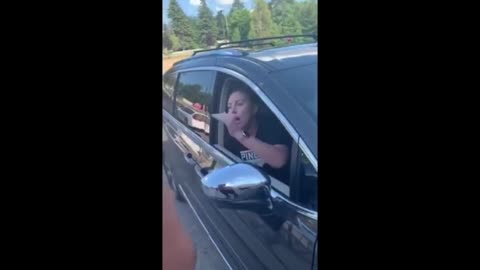 Full video: Woman punched armed woman's car, said "I'll beat your white a**"
