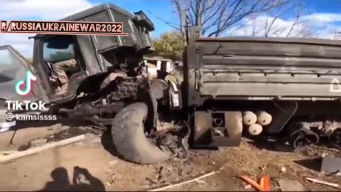 Ukrainian soldiers stop to inspect a destroyed Russian Vehicle - Somewhere in the South