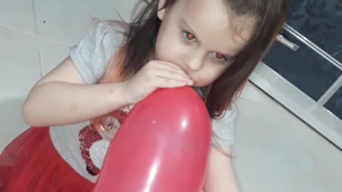 Funny toddler fails to inflate the ballon hilariously