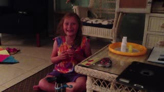 8 year old laughs hysterically and sings her favorite song