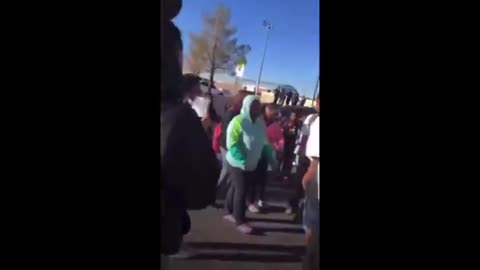 Insane Black Woman goes nuts & tries to plow down kids with a minivan after punching one in the face
