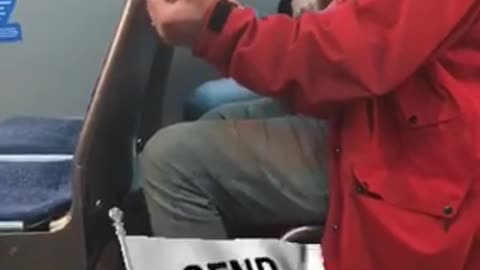 Nsfw man red jacket licks foot on bus