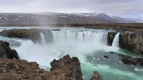 Nice Waterfall Near Mountains