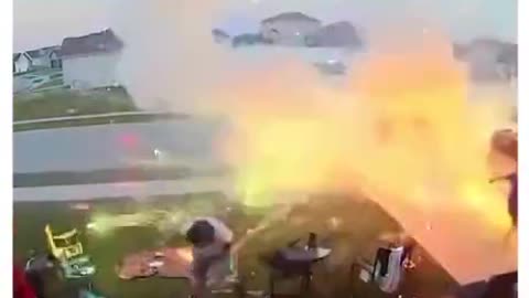 HOLY FUCK! family fire work night turns crazy when box full catches alight.