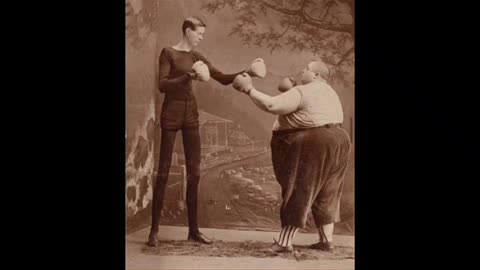 GEORGE MOORE”THE LIVING SKELETON “ AND FRED HOWE “THE FAT MAN” FUNNEST BOXERS IN THE WORLD USA 1897