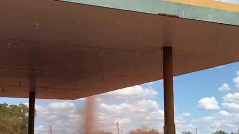 Impressive Dust Devil by Gas Station