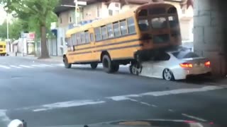 Crashed Car Under School Bus