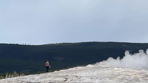 Tourist Too Close To Old Faithful