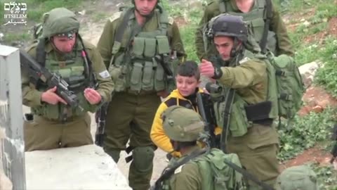 Israeli_soldiers_drag_8-year-old_from_home_to_home_looking_for_stone-throwers,_Hebron,