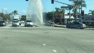 Busted Fire Hydrant Sprays Sky High at Intersection