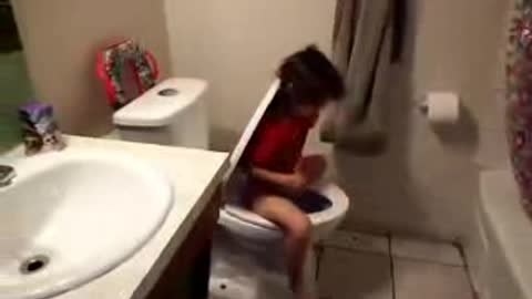 little girl has funny way of pooping