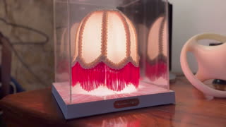 Mini Teca Renaissance Table Lamp (2009) by Ron Gilad for Flos