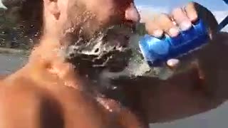 Speed Boat Driver Chugs His Drink with Difficulty