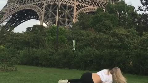Collab copyright protection - girl does backflip at eiffel tower