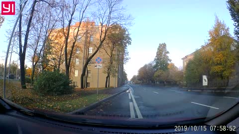 Tight Squeeze Sends Sedan on its Side