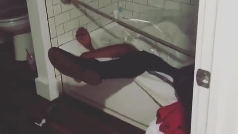 Drunk guy falls in shower curtain