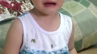 baby arguing with mom