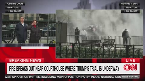 CNN live as person sets himself on fire outside the Trump courthouse in New York
