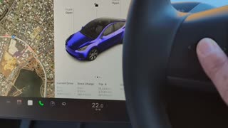 Programming the left scroll wheel in a Tesla