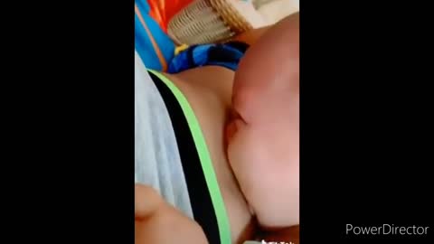 Toddler playing with mom in an adorable way