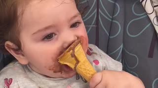 Baby makes adorable mess eating ice cream