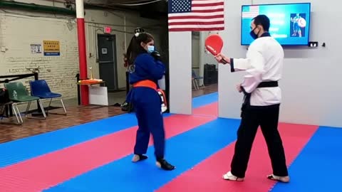 Amanda Sharpening Her Kicks at New Age Taekwondo