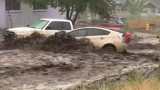 Intense Flooding Carries Cars Away