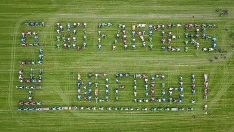 Dutch Farmers convoy: Dutch tractors spell 'Help! No Farmers No Food."