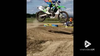 Dirt bike catches rider on the head