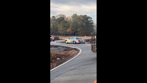 Raw video- Train crashes into car in Georgia as driver escapes just before impact.