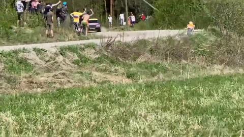 Rally car crashes just few inches from hitting spectators