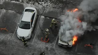 Car Explodes in Parking Lot