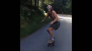 Dude skateboarding with Iron Man mask wipes out hard