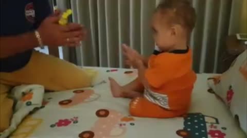 Dad Teaches Toddler Son To Disinfect His Hands