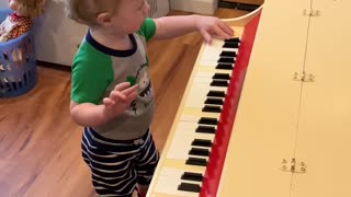 Piano playing Great Grandson