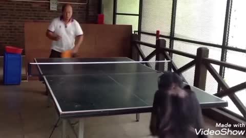 Baby Chimpanzee is having an amazing Table tennis skill that his opponent can't stand against him