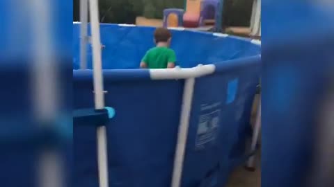 Collab copyright protection - little boy slips plastic pool