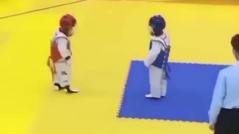 HILARIOUS!🤣😂 Kid pretends to fall during Taekwondo match