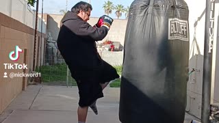 500Lb Punching Bag Workout Part 20. Practicing Thai Kicks & Knees!