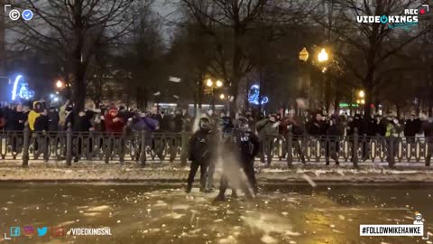 Cops attacked with a million snowballs by angry mob.