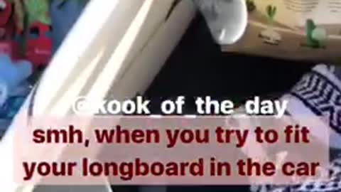 Boomerang video of a surfboard not fitting in a car