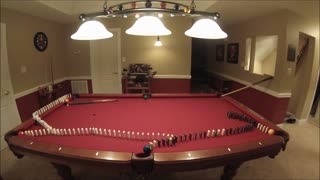 Awesome billiards trick shot using Dominoes